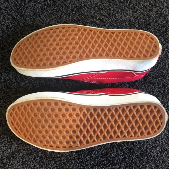 black and white checkered vans with red drip